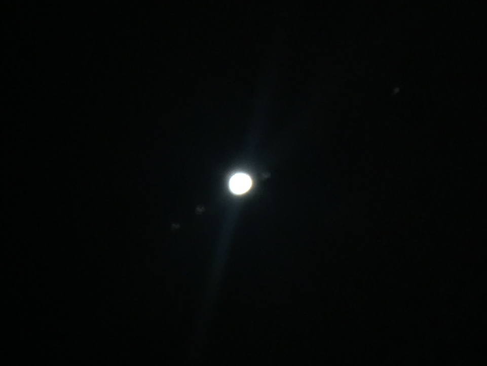 Jupiter and 4 of its moons.